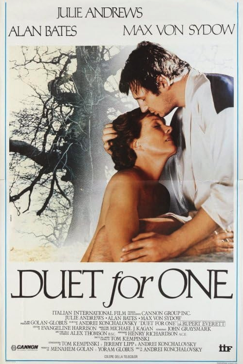 Poster of the film showing a white woman and a white man holding each other. The man kisses the woman's forehead.