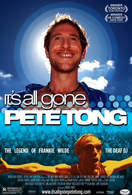 Poster of the film showing the photo a white man with a big smile on his face on the top, and the same man wearing sunglasses, arms open in front of a crowd.
